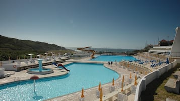 Seasonal outdoor pool, pool umbrellas, sun loungers