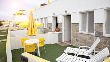 Family Studio, Patio, Garden Area | Terrace/patio