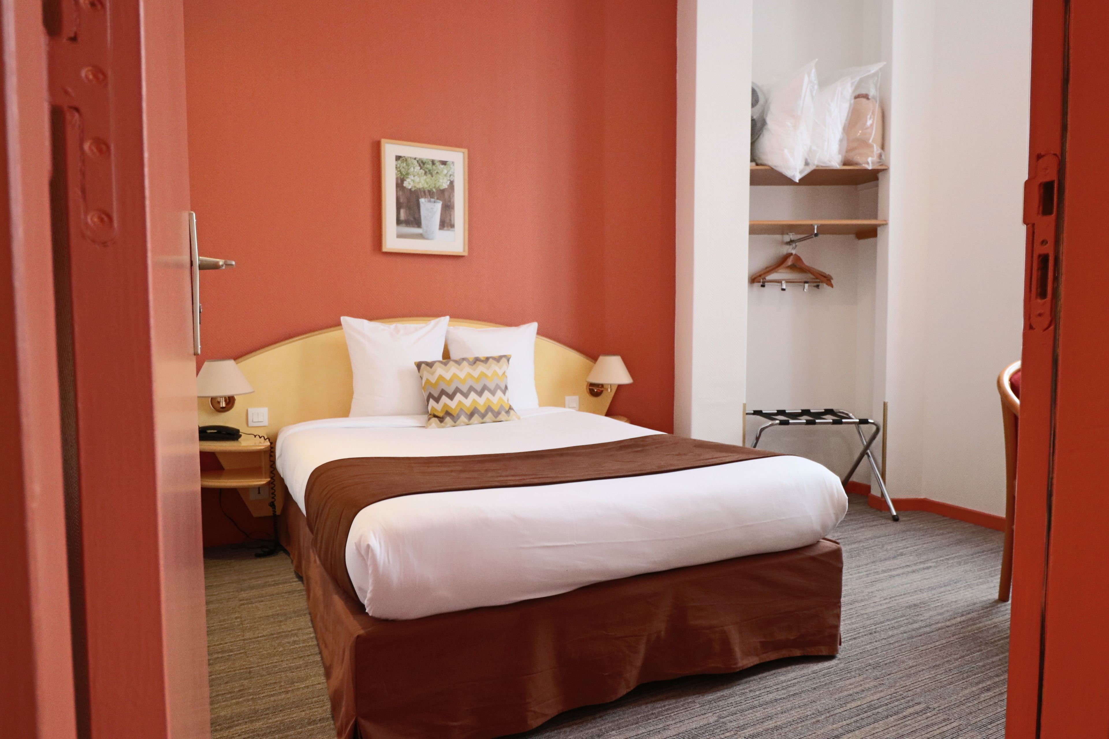 family room | desk, soundproofing, iron/ironing board, free cots/infant beds