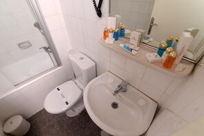 Separate tub and shower, free toiletries, hair dryer, bathrobes