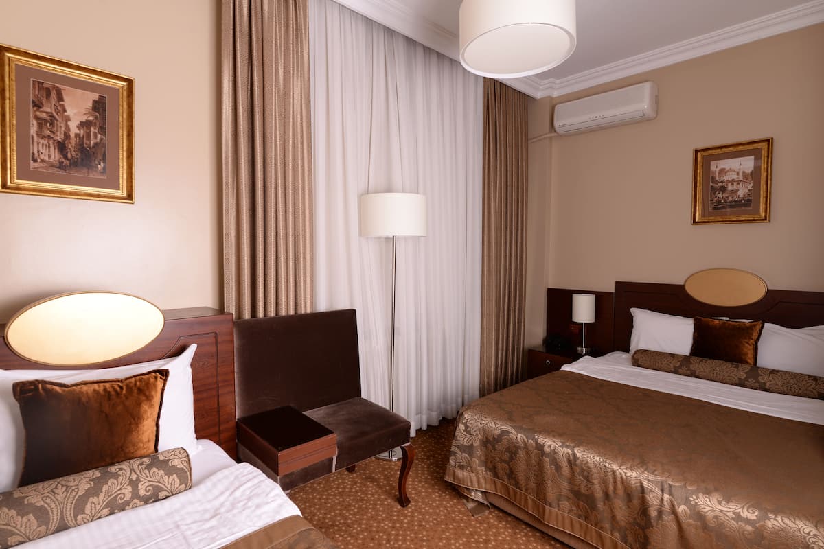 Family Room | Minibar, soundproofing, free cribs/infant beds, free WiFi