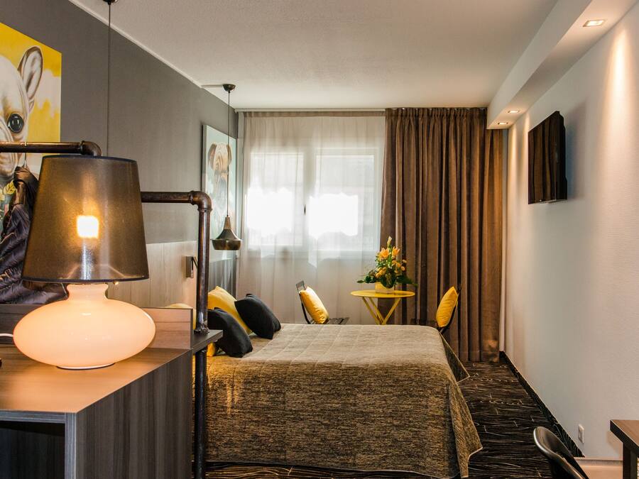 Desk, blackout drapes, soundproofing, iron/ironing board