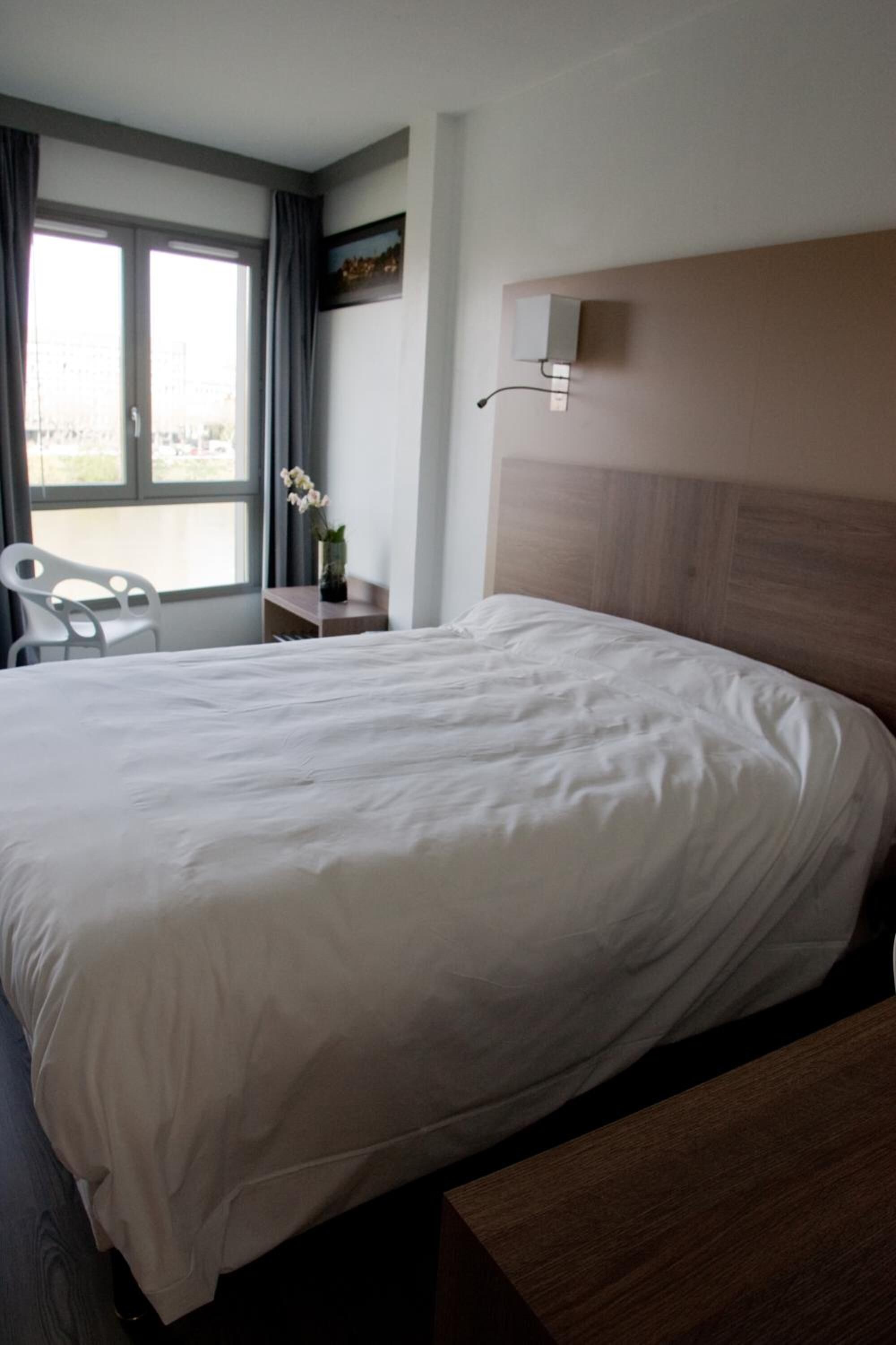 desk, blackout curtains, soundproofing, iron/ironing board