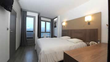 Desk, blackout drapes, soundproofing, iron/ironing board