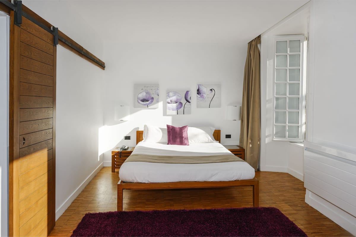 superior double room | in-room safe, individually decorated, desk, blackout curtains