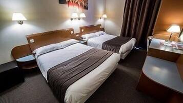 Premium bedding, desk, blackout curtains, soundproofing