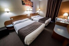 Premium bedding, desk, blackout drapes, soundproofing