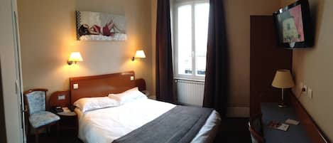 Yhden hengen standard-huone | Ylelliset vuodevaatteet, työpöytä, pimennysverhot, äänieristys