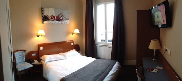 single standard | Premium bedding, desk, blackout drapes, soundproofing