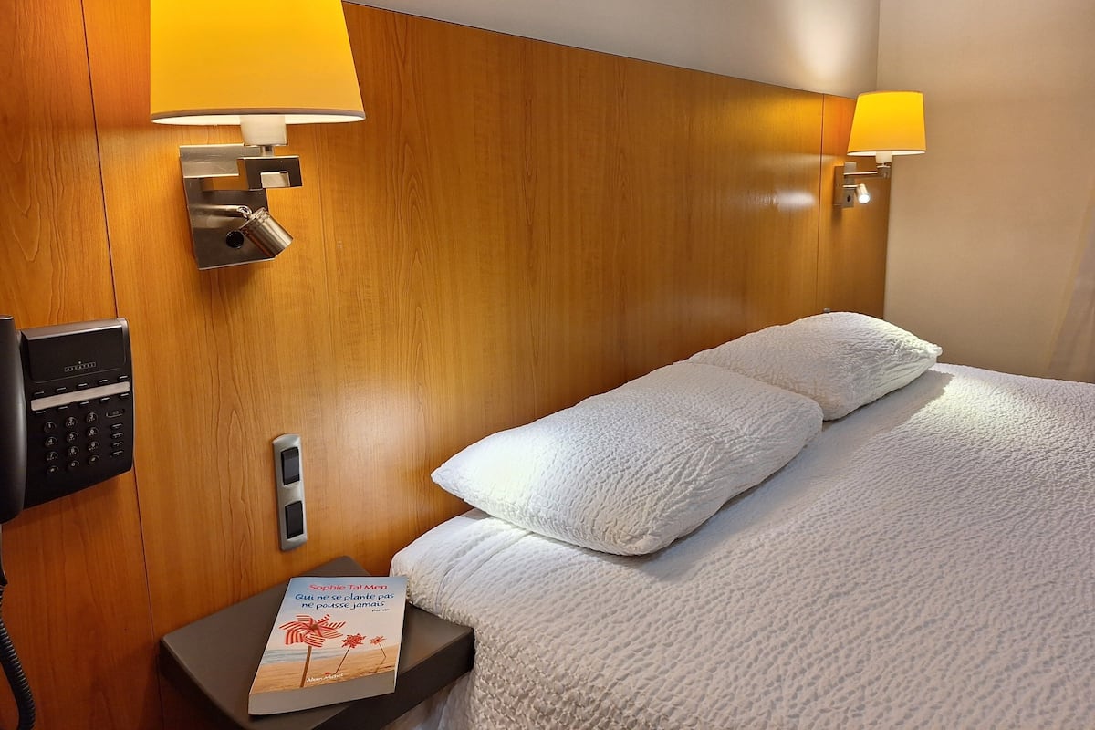 Desk, blackout curtains, soundproofing, iron/ironing board