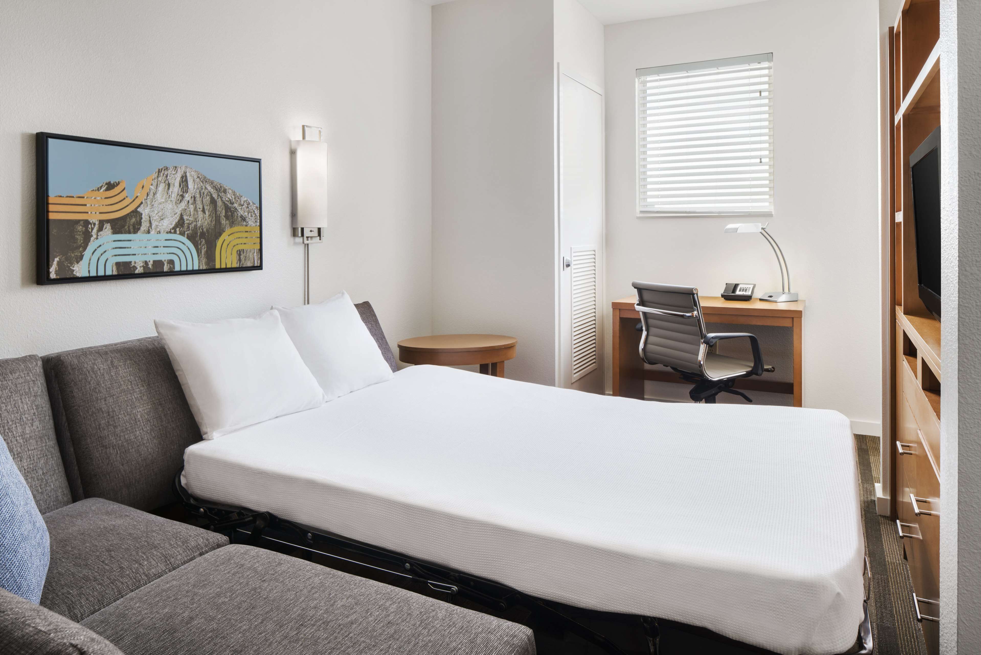 desk, blackout curtains, iron/ironing board, free wifi