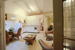 Standard Duplex, Garden Area | Living area | 32-cm flat-screen TV with digital channels, TV, iPod dock