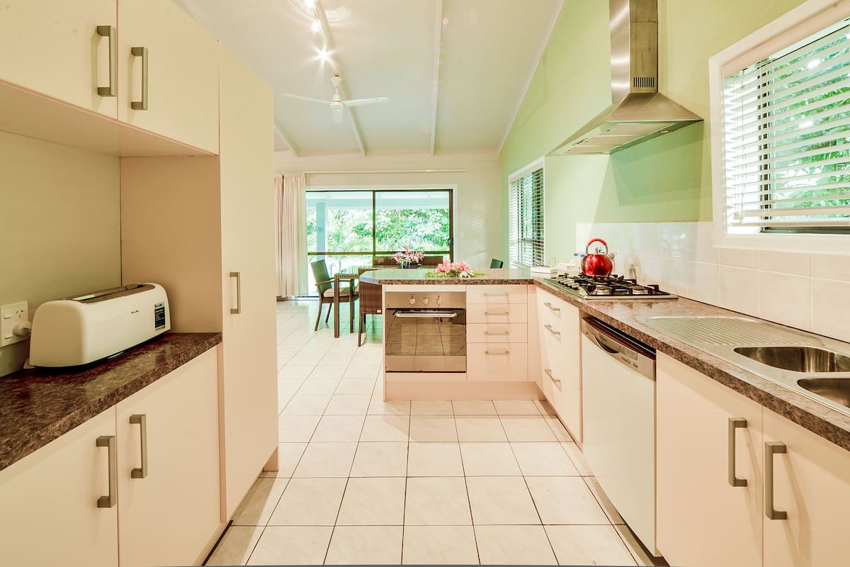 villa, 3 bedrooms, beachside | private kitchen | full-sized fridge, microwave, stovetop, coffee/tea maker