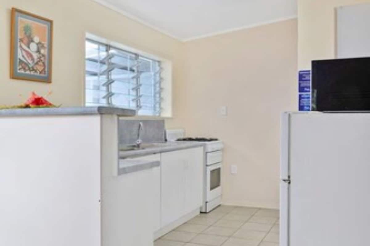 full-sized fridge, microwave, stovetop, coffee/tea maker