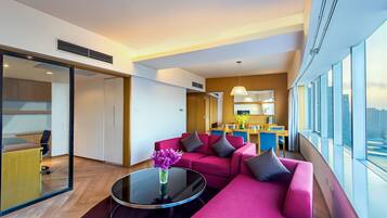 Premium bedding, down comforters, pillowtop beds, in-room safe