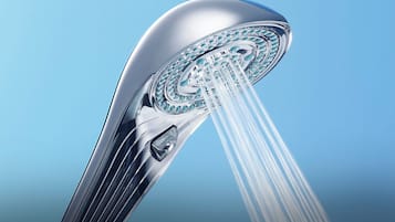 A modern faucet with a clear water flow.