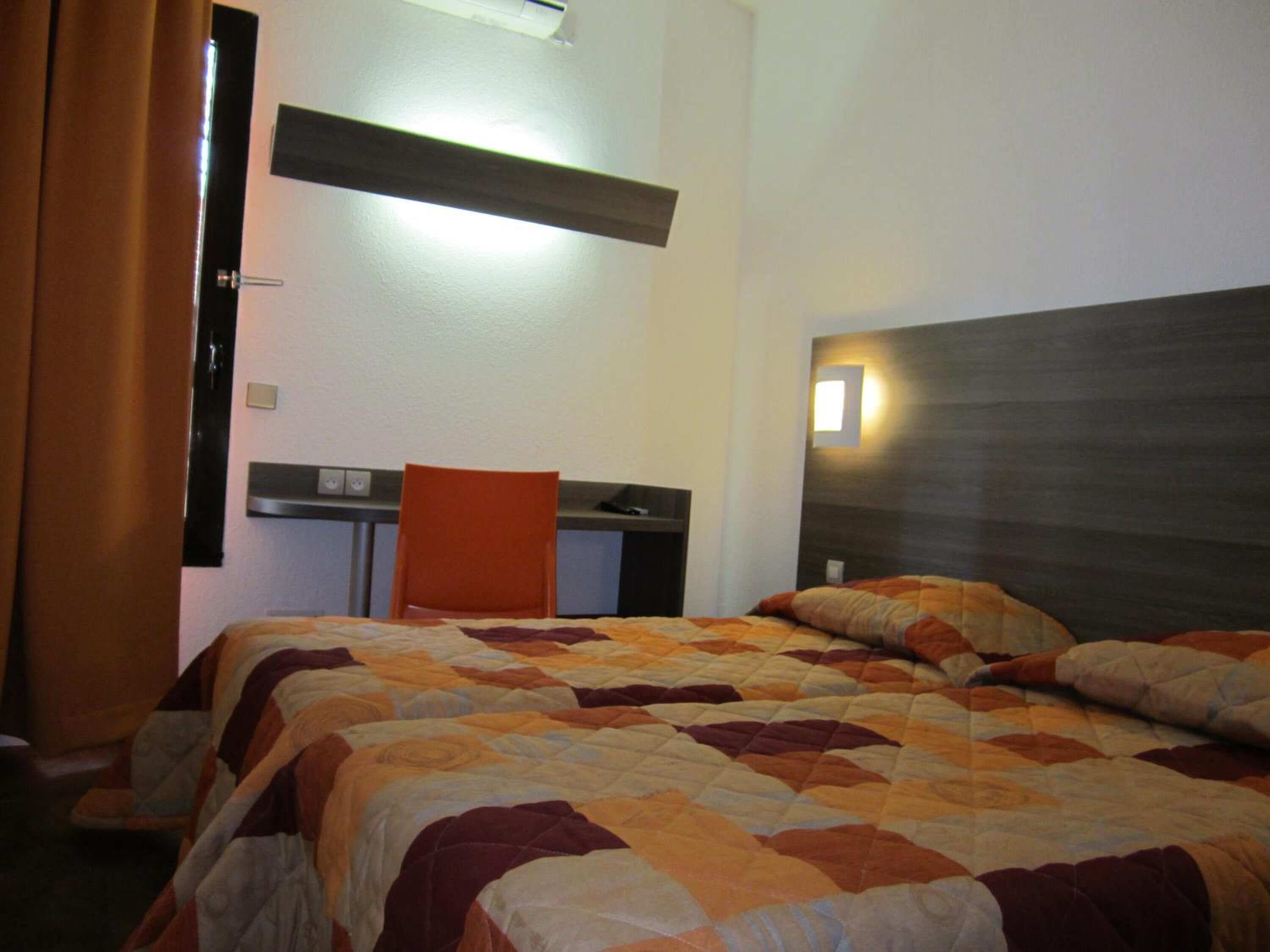 Desk, free WiFi, bed sheets