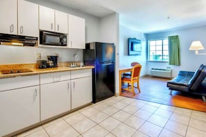 Fridge, microwave, coffee/tea maker, dining tables