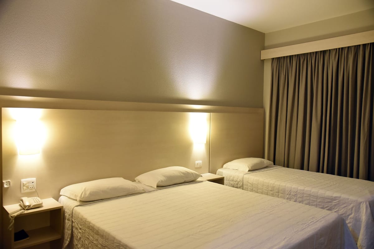 superior triple room | pillow-top beds, minibar, in-room safe, desk