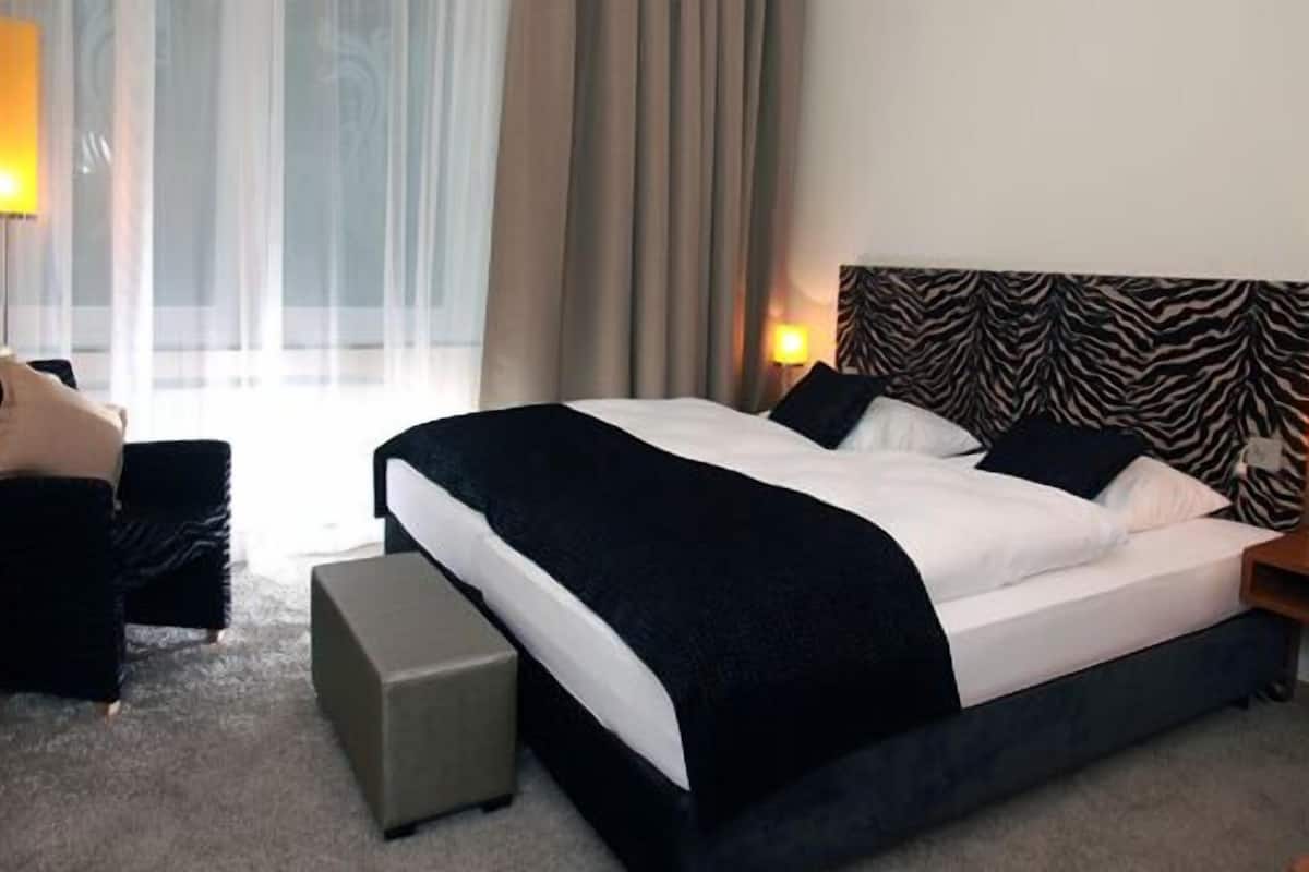 Biancheria da letto ipoallergenica, minibar, una cassaforte in camera