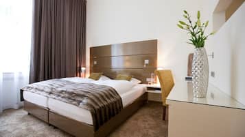 Suite – superior | Allergitestet sengetøy, minibar, safe på rommet og individuelt innredet