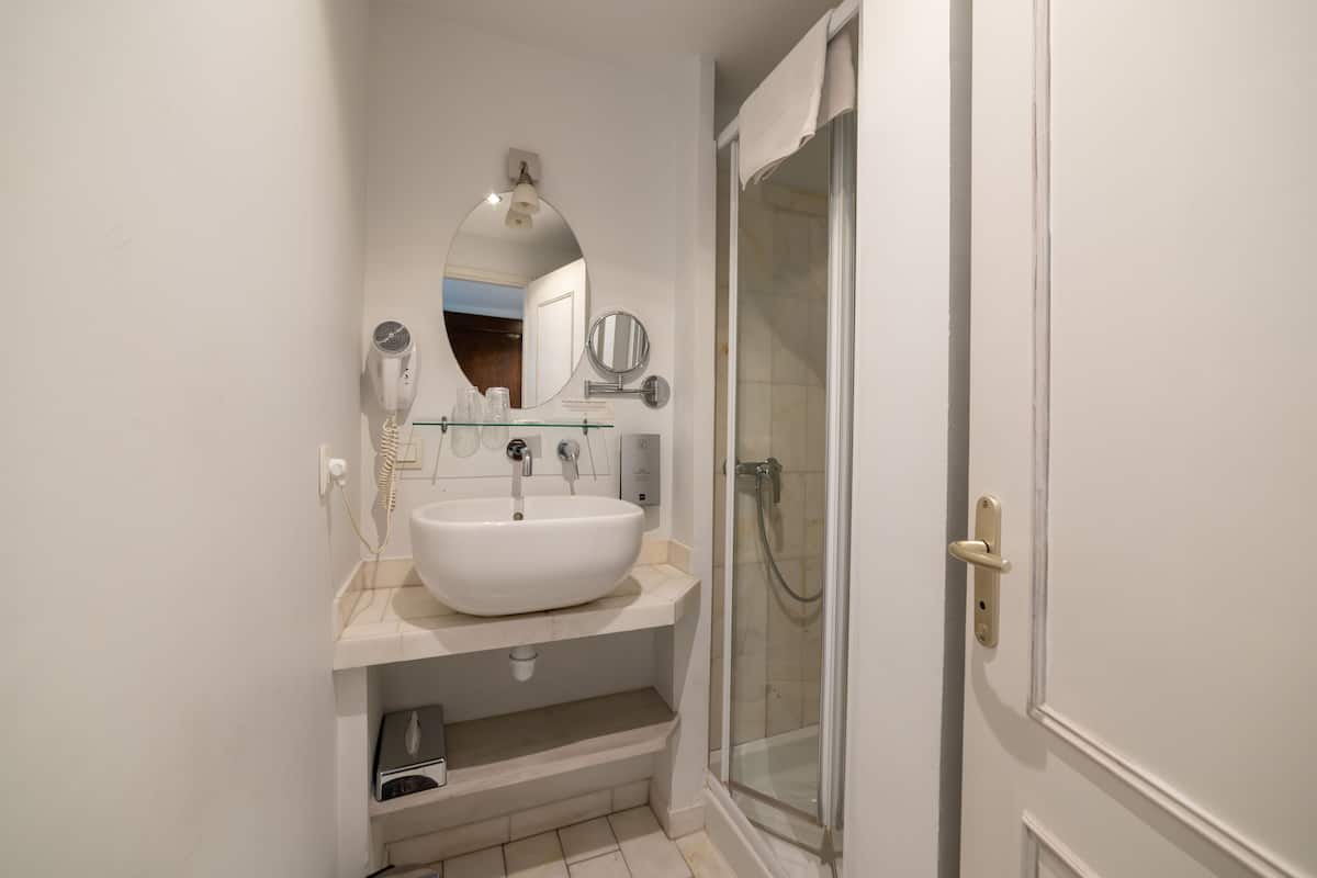 eco-friendly toiletries, hair dryer, towels, soap