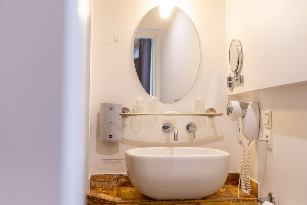 superior room | bathroom | eco-friendly toiletries, hair dryer, towels, soap
