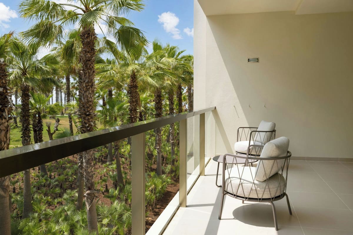 Suite, 3 Bedrooms, Balcony, Pool View | Minibar, in-room safe, blackout drapes, soundproofing