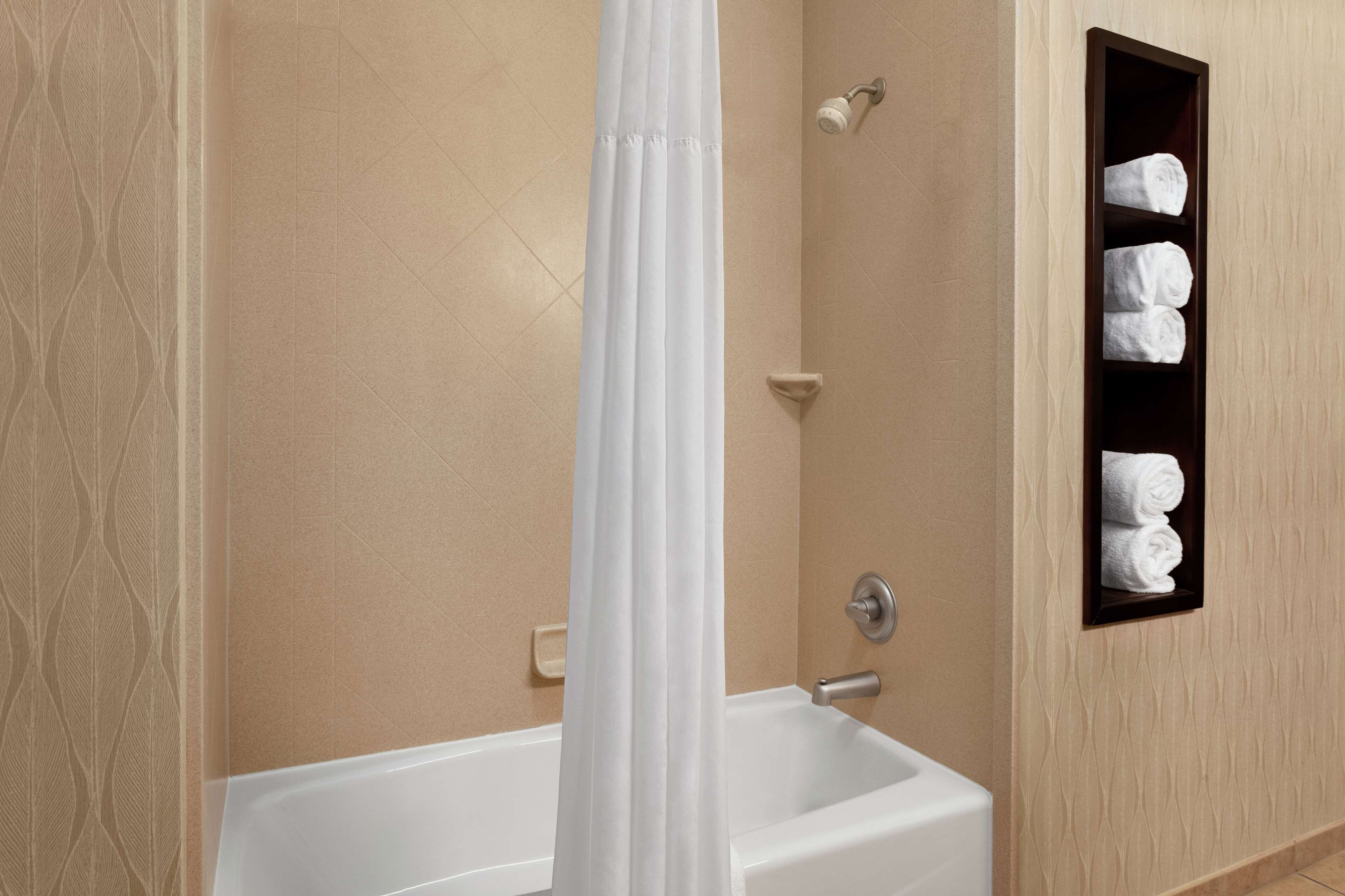 two queens | bathroom | bathtub, hair dryer, bathrobes, towels