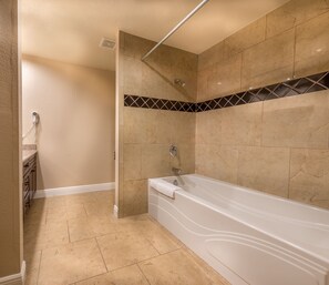 One King Bed, Non-Smoking | Deep soaking bathtub