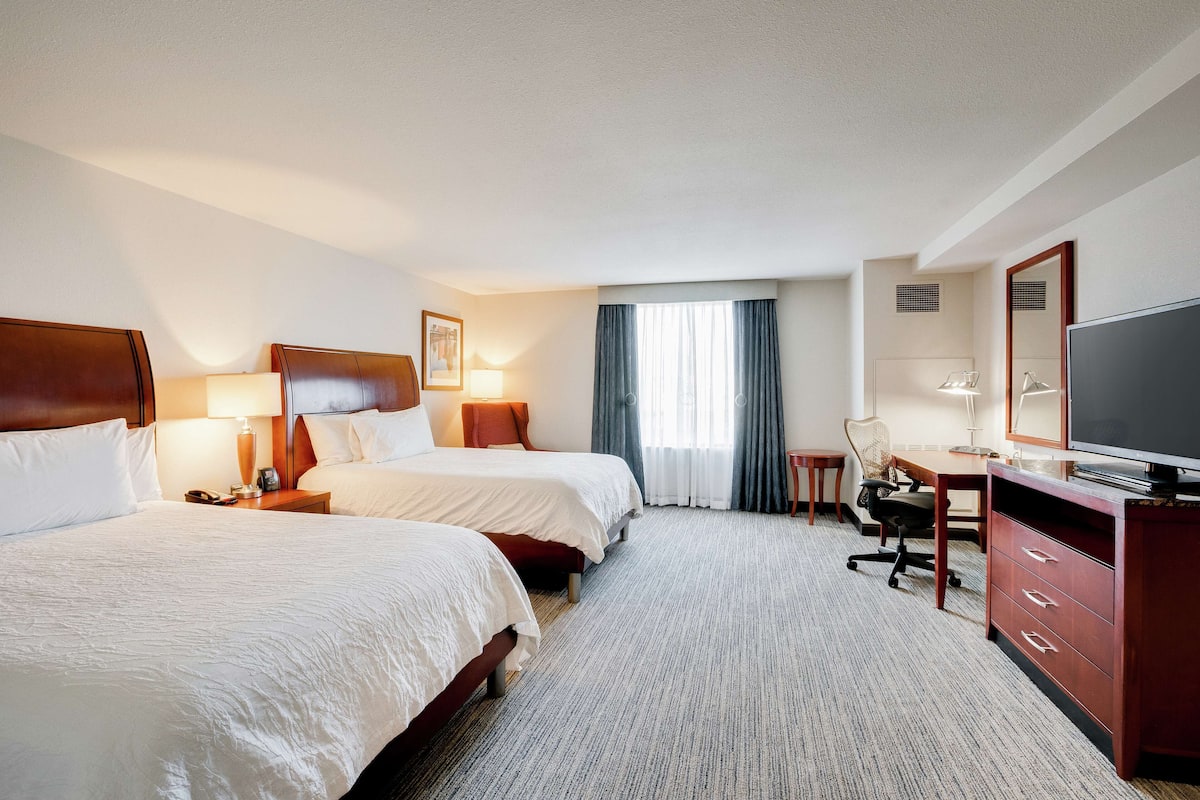 hypo-allergenic bedding, down duvets, pillow-top beds, blackout curtains