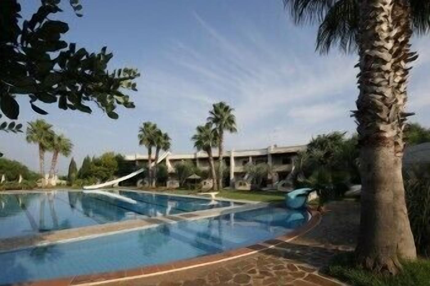 indoor pool, outdoor pool, pool umbrellas