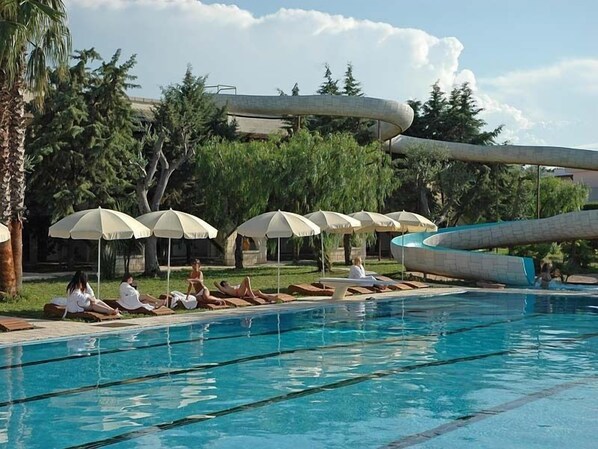 Indoor pool, outdoor pool, pool umbrellas