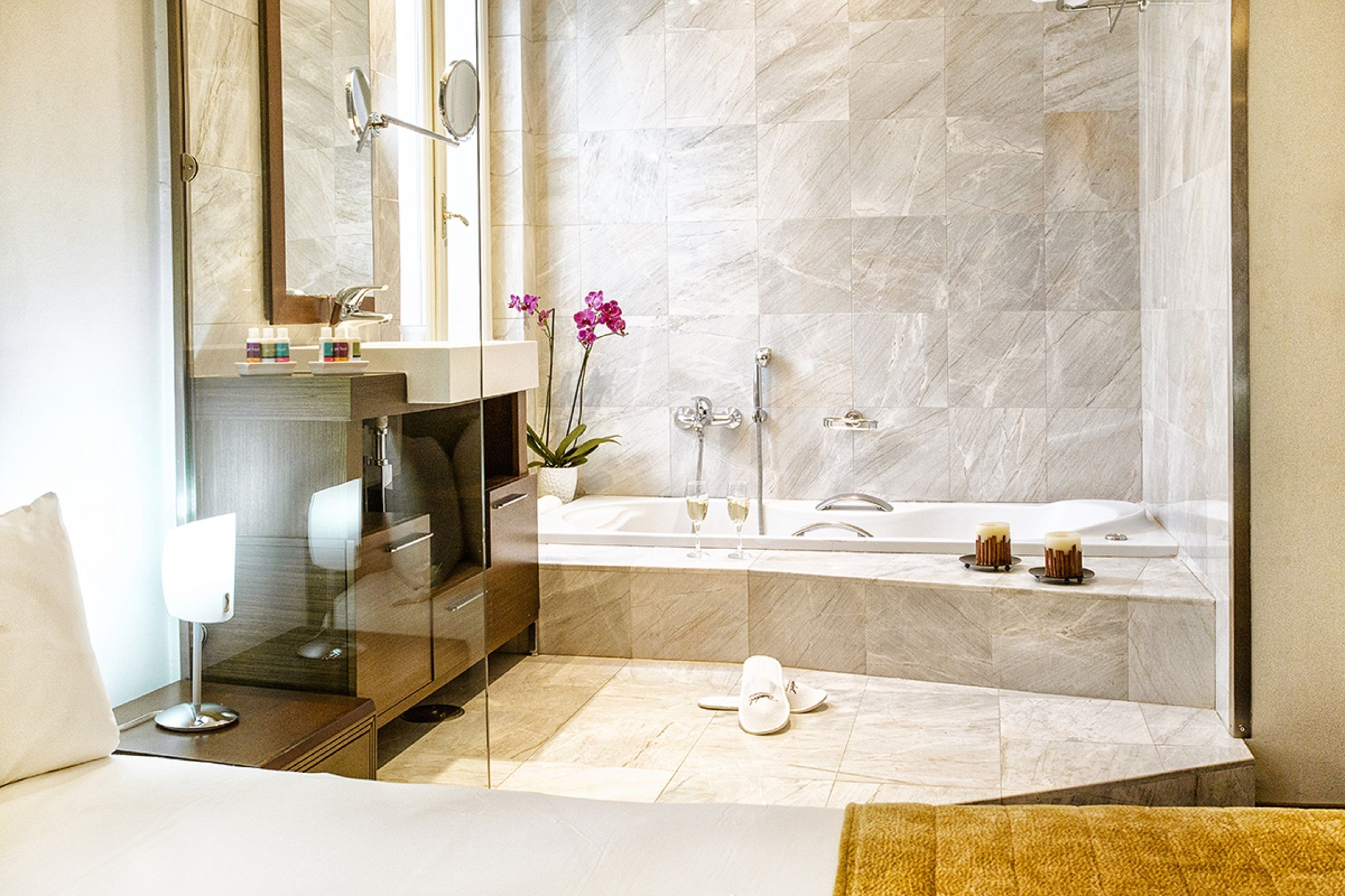premium suite | bathroom | free toiletries, hair dryer, slippers, towels