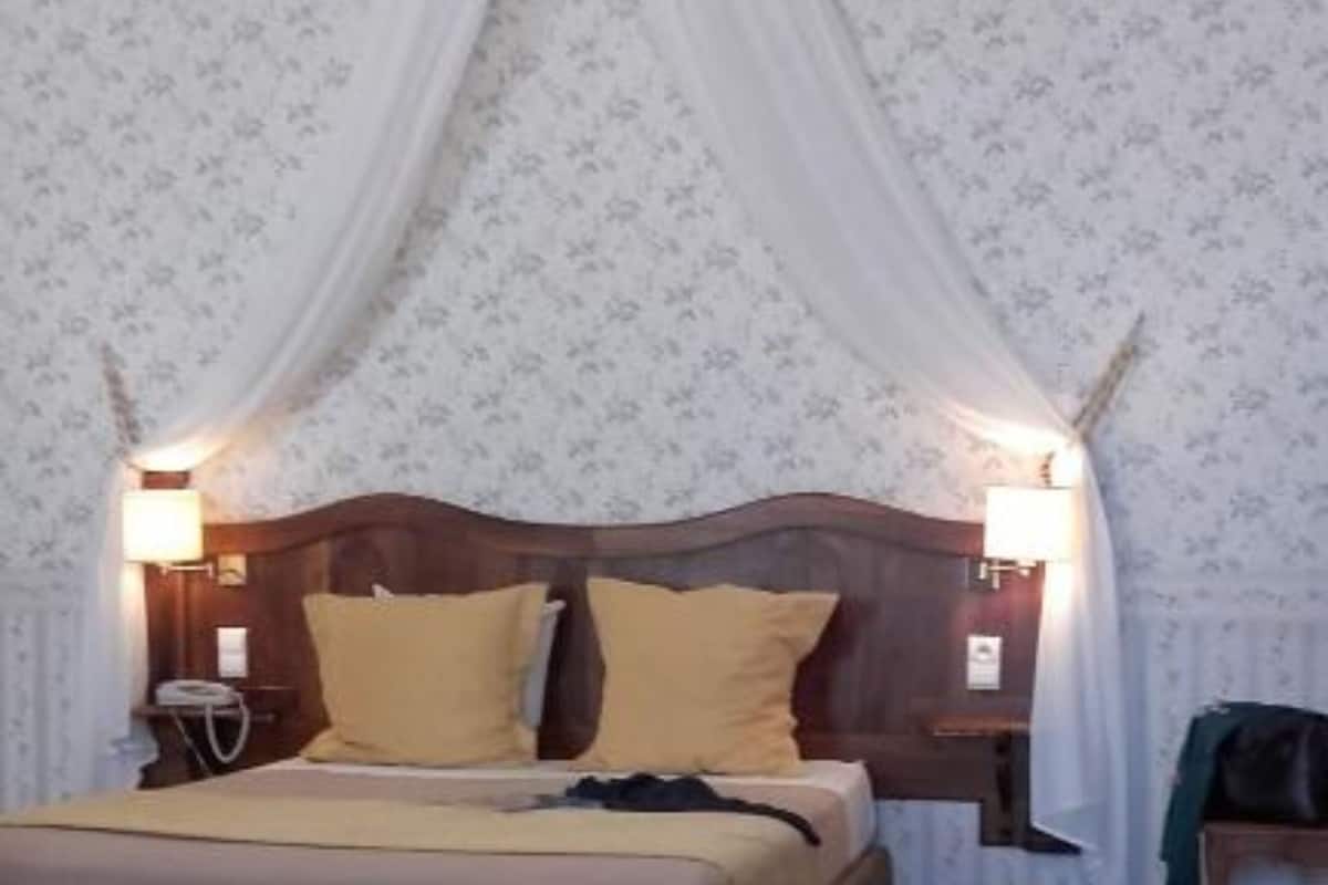 family room | in-room safe, individually decorated, individually furnished, desk