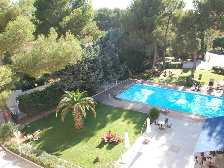 Seasonal outdoor pool, pool umbrellas, pool loungers