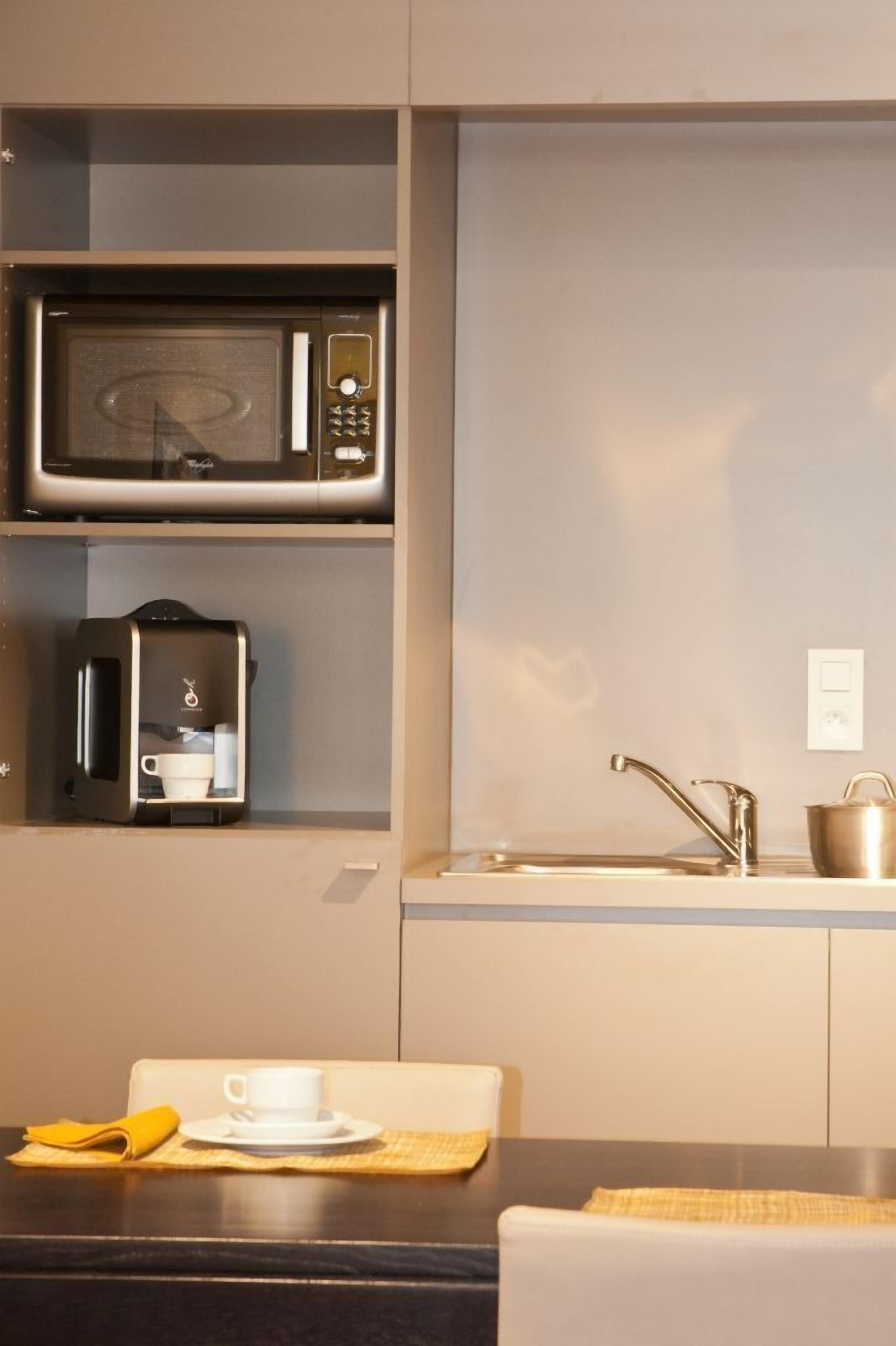 fridge, espresso maker, coffee/tea maker, electric kettle