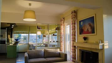Superior Apartment, 2 Bedrooms, Sea View | Living room | Flat-screen TV, DVD player