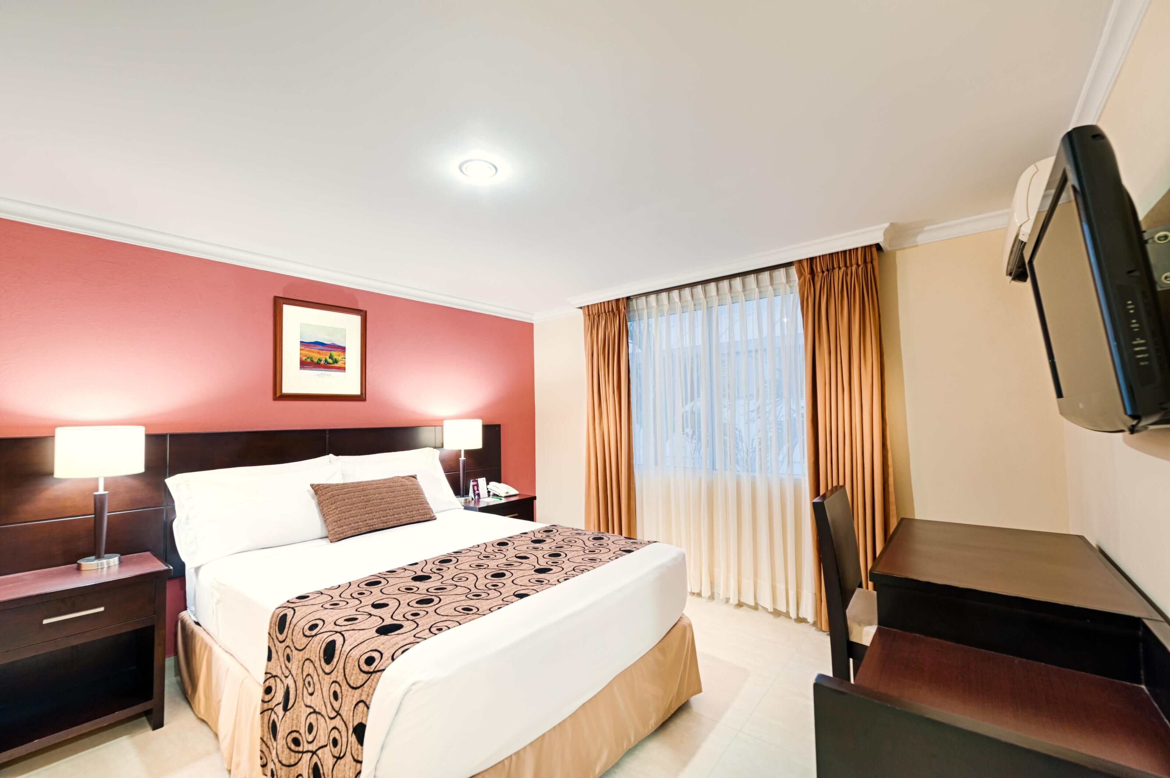 Ropa de cama de alta calidad, minibar, caja fuerte