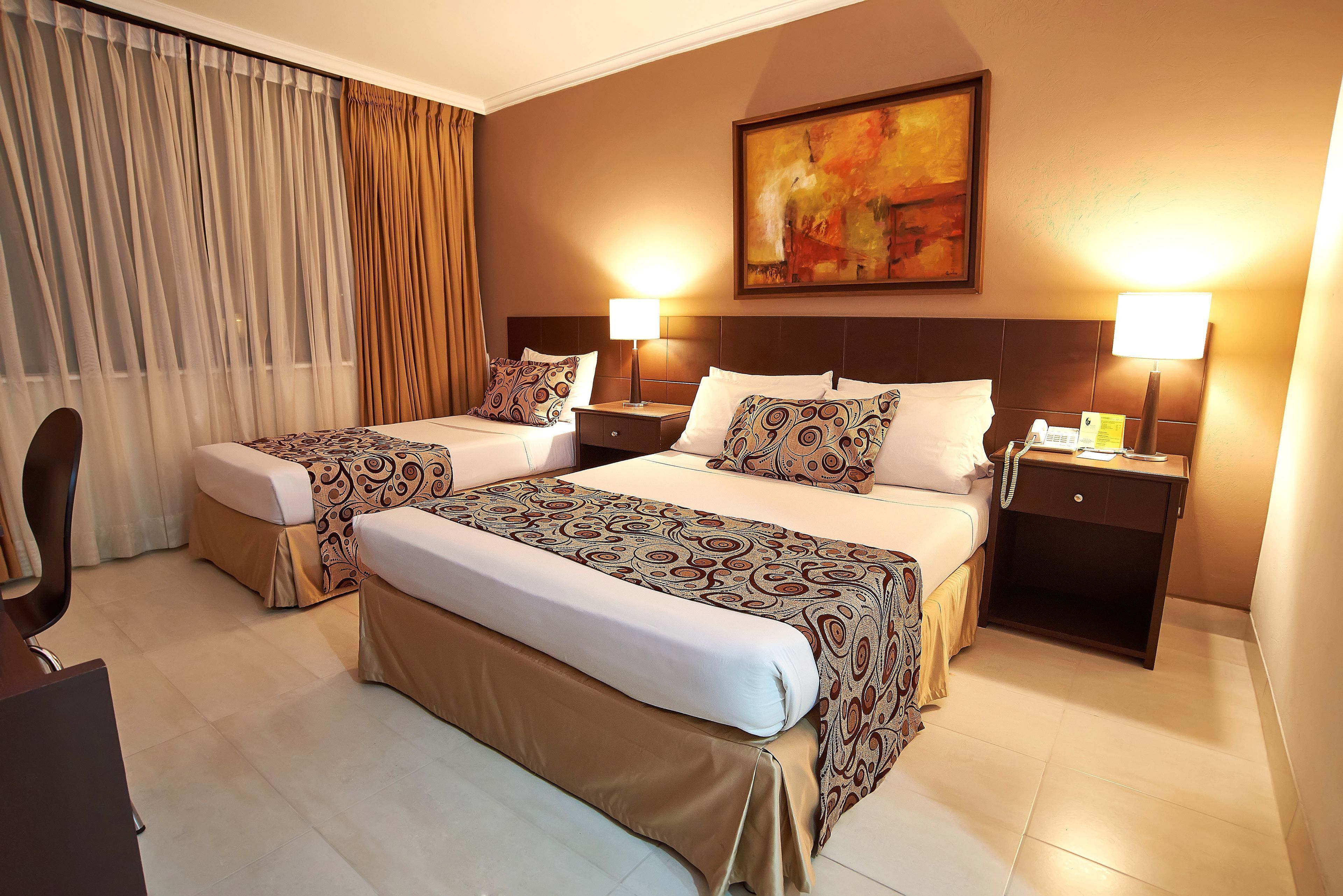 Ropa de cama de alta calidad y minibar 