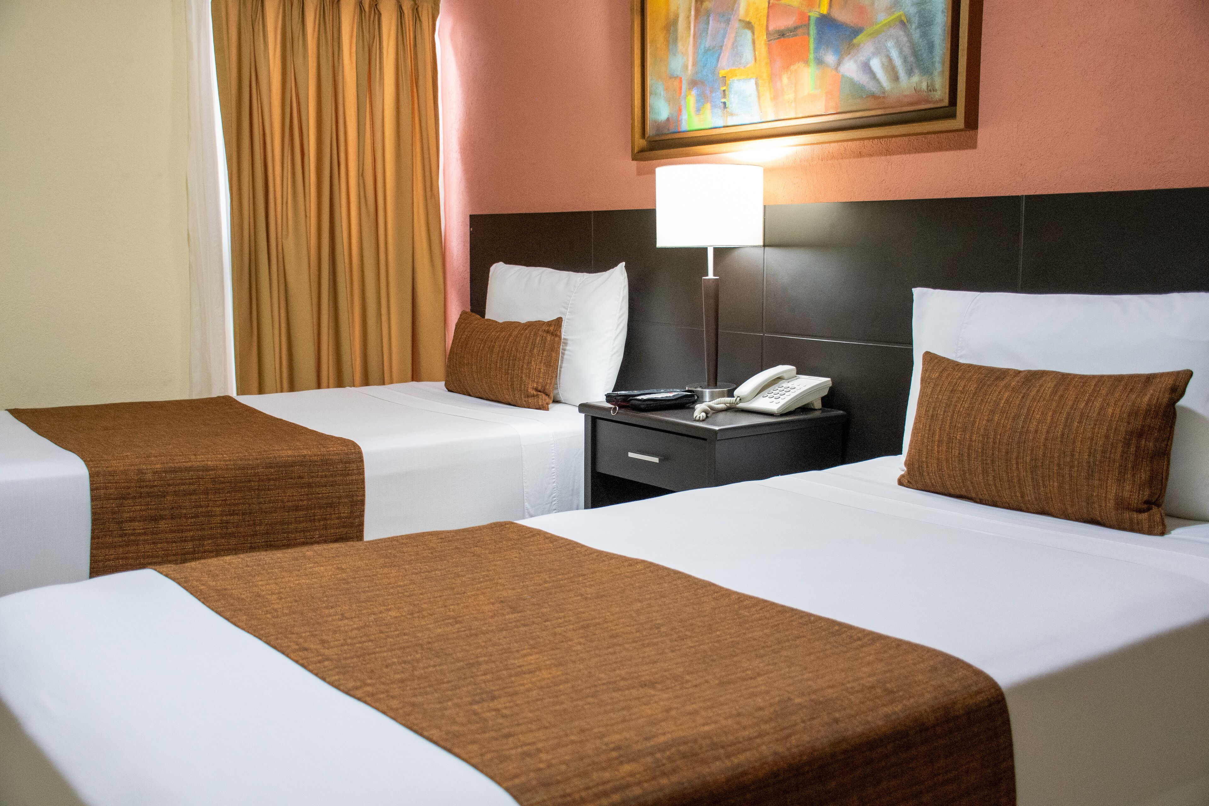 family room | 1 bedroom, premium bedding, minibar, in-room safe