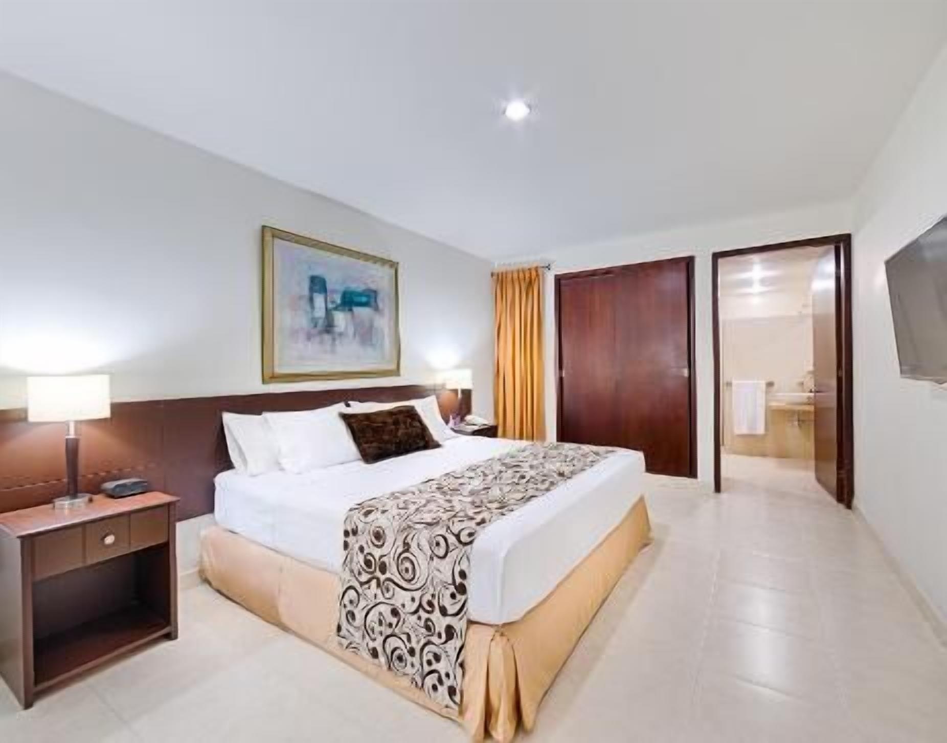 Ropa de cama de alta calidad, minibar, caja fuerte