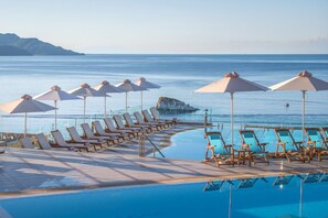 Indoor pool, 3 outdoor pools, open 10:00 AM to 7:30 PM, free cabanas