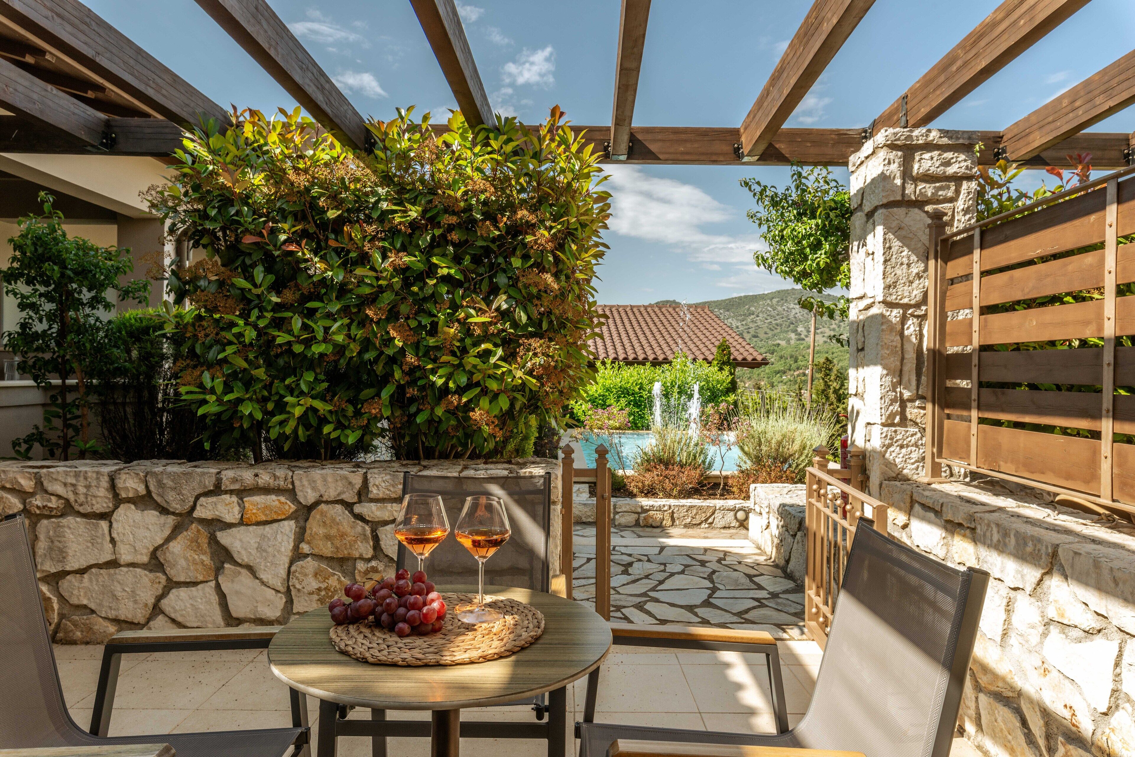 deluxe junior suite, mountain view | terrace/patio