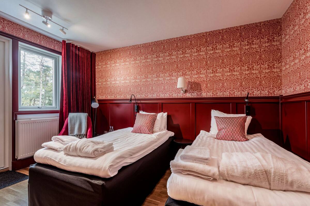 Desk, blackout drapes, soundproofing, iron/ironing board