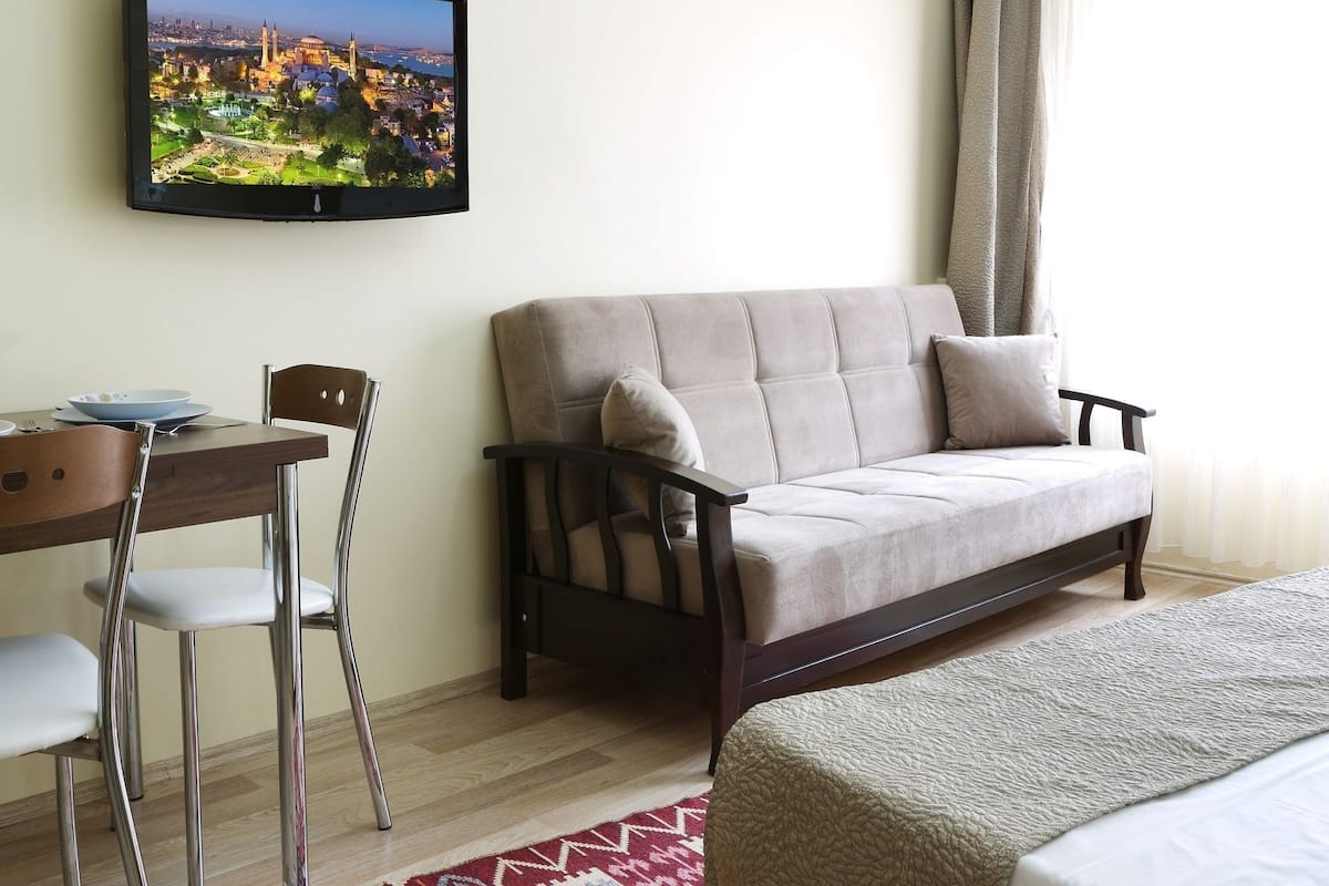 82-inch TV with satellite channels, DVD player