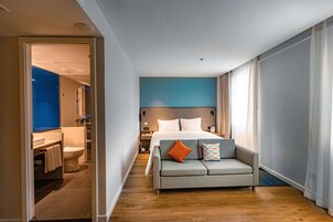 1 King Standard Extra Floor Space | In-room safe, blackout drapes, iron/ironing board, free WiFi