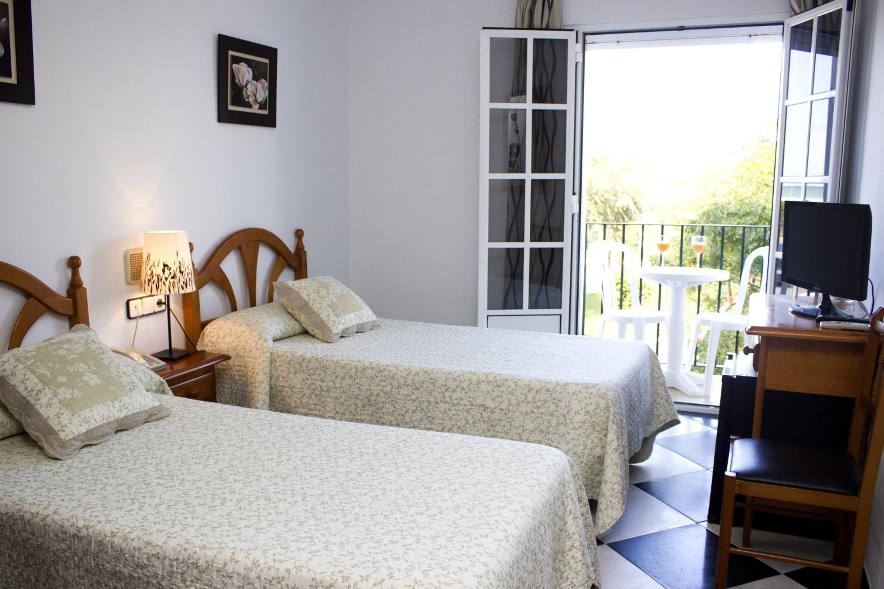 memory-foam beds, minibar, desk, laptop workspace