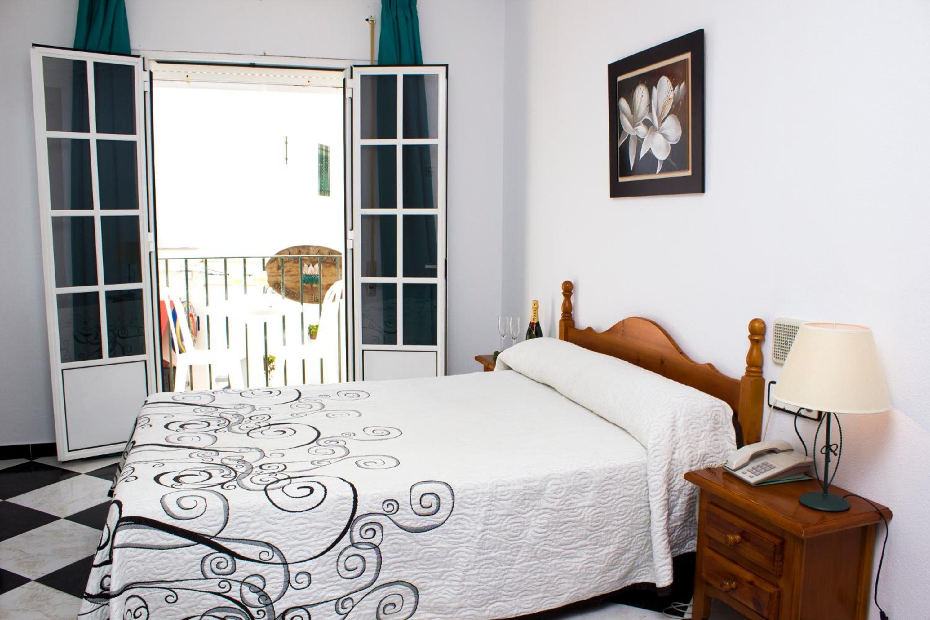 memory-foam beds, minibar, desk, laptop workspace