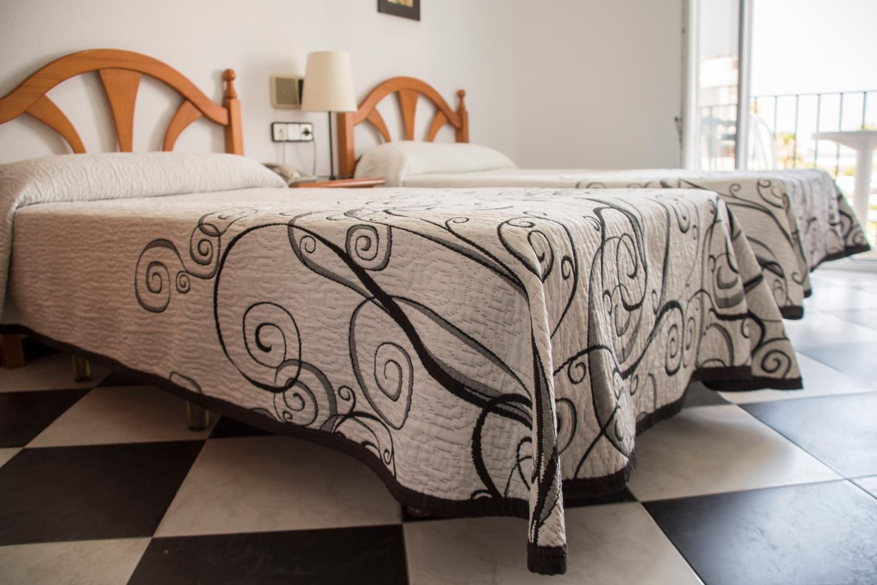 memory-foam beds, minibar, desk, laptop workspace